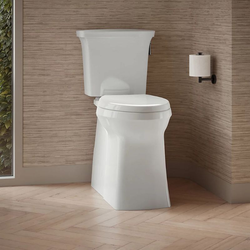 Corbelle Tall Two-Piece Elongated Toilet With Skirted Trapway
